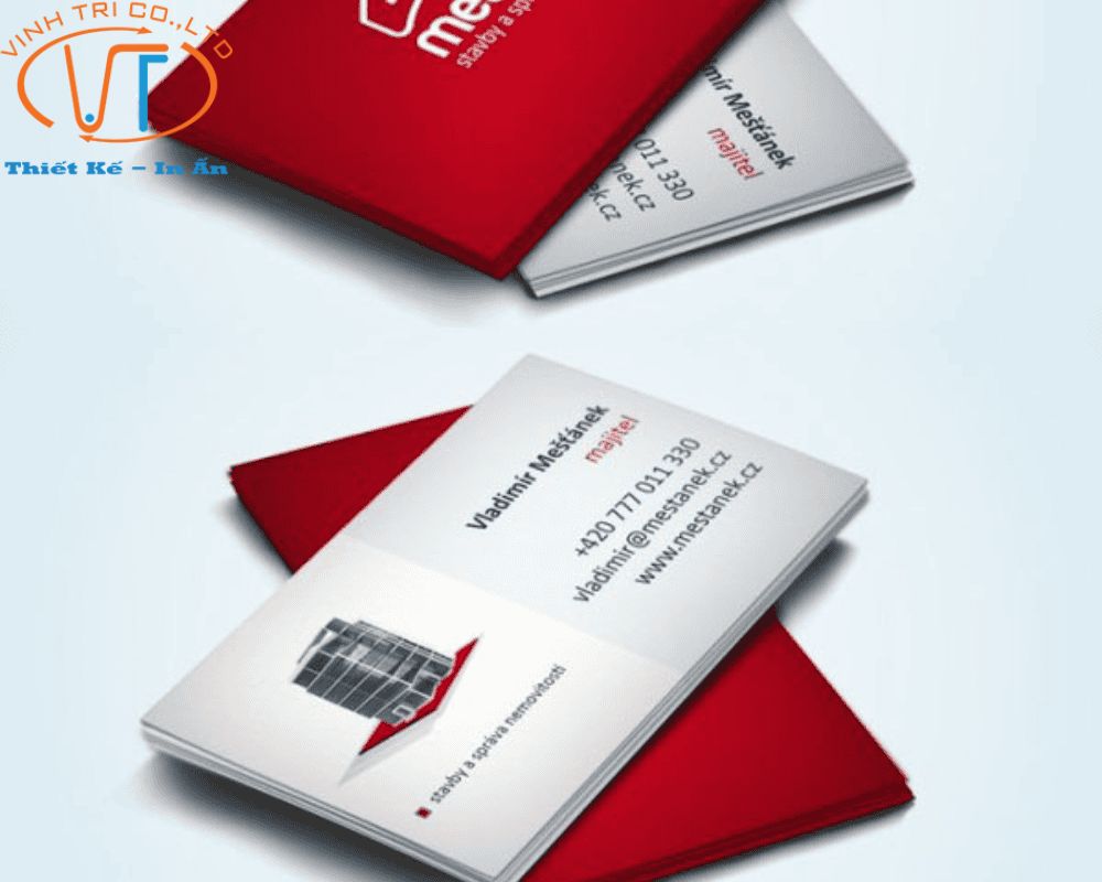 Mẫu card visit bất động sản với gam màu đỏ bắt mắt, hình ảnh tòa nhà độc đáo