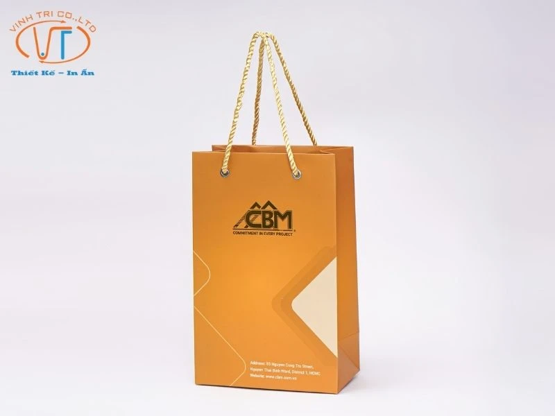 Túi giấy màu cam dây xoắn
