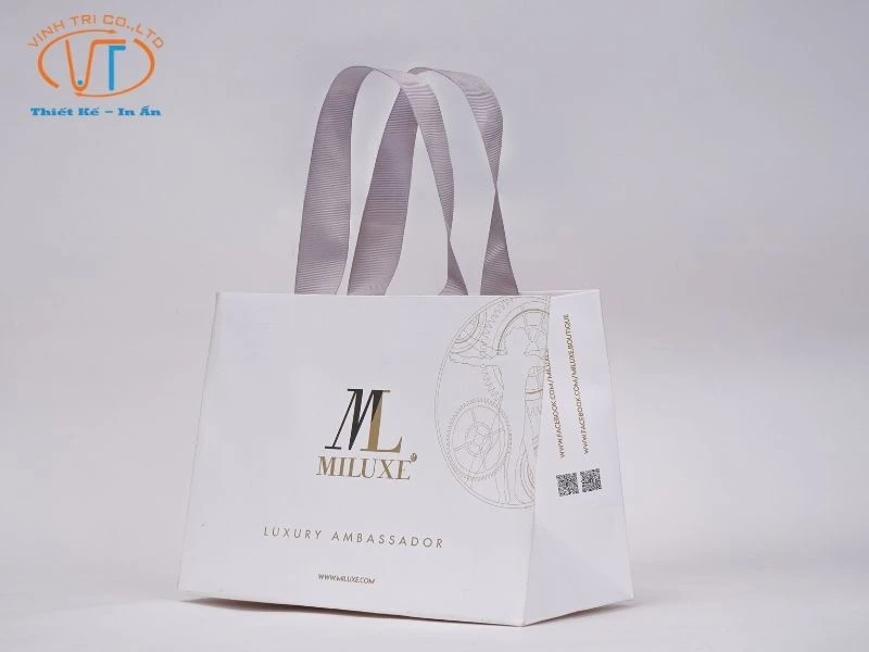 Mẫu túi giấy couche dây ruy băng, dạng đứng thương hiệu MILUXL